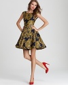 Exude ladylike charm in this shimmering floral-print Alice + Olivia dress, boasting a charming full skirt.