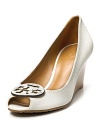 Hot-to-trot: Tory Burch's Sally wedges are the perfect hybrid of your favorite flats, wedges and peep toes in one, finished off with signature logo details.