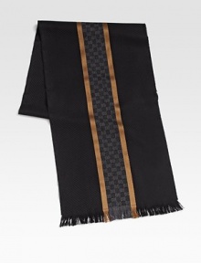 Winter scarf with interlocking GG pattern, stripes and fringe. 13¾W X 71L Silk/wool; dry clean Made in Italy 