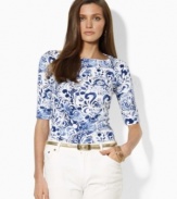 A chic boat neckline lends Lauren by Ralph Lauren's ultra-soft cotton shirt, finished with elbow-length sleeves and rolled cuffs, a modern, casual appeal.