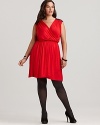 Exposed zippers put an edgy twist on this Love Ady dress, boasting a flattering faux wrap silhouette in a fiery red hue.