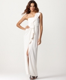 Be goddess-chic in this head-turning BCBGMAXAZRIA gown. A front slit reveals a sexy peek of leg with every step.