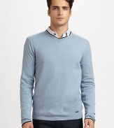 Luxuriously soft cashmere pullover, in a finespun knit finished with a sophisticated V-neck and contrast trim at the collar and cuffs.V-neckCashmereDry cleanImported