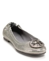 Classic Tory Burch flats get a luminous lift in metallic crosshatch, complete with gleaming logo medallions.