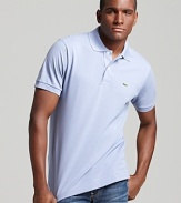 Lacoste's modern classic looks better than ever. The 2 button polo with the iconic alligator logo at the left chest.