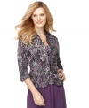 A subtle animal print and a lot of sparkle make this jacket and cami combination a standout for special occasions.