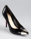 A mirrored cap toe adorns a pointed silhouette from GUESS.