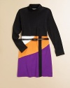 Unique colorblock construction adds a splash of color to this mock neck style; completed with a belted waist for a polished look. Mock neck Belted waist Back zip closure 95% cotton/5% spandex Fully lined skirt Machine wash Imported 