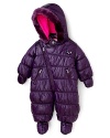 A purple suit with an asymmetric zipper and a faux fur trimmed hood offer stylish warmth for you little snow bunny, complete with removable hood, mittens and booties. By Diesel.