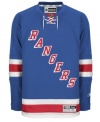 Few franchises have ever reached the rarefied air of the New York Rangers. Pay a sweet tribute to a true icon of the National Hockey League and throw on this replica sweater from Reebok.