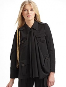 An avante-garde silhouette impeccably tailored in fine Italian wool, fuses the drama of a cape and the warmth of a jacket.Asymmetrical point collar Epaulettes with dangling goldtone chains Left cape sleeve Right long sleeve Sleeves have four button cuffs Front button closure Center front drape Front button flap pockets Back flap shoulder yoke Back vented hemAbout 24 from shoulder to hem Fully lined Wool; dry clean Made in Italy