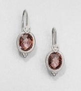 Beautifully faceted raspberry crystal stones set in intricately designed, sterling silver accented with dazzling white sapphires. Raspberry crystalsSterling silverWhite sapphiresDrop, about 1.4Hook backImported