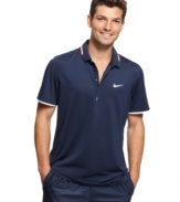 Game, set, match. You'll be the big winner in this comfortable Roger Federer tennis polo shirt from Nike.