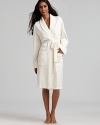 Wrap yourself in a luxuriously soft robe with a quilted shawl collar and cuffs.