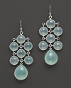 Softly-hued seafoam chalcedony, set in sterling silver, mimics the color of a summer sky. By Elizabeth Showers.