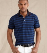 On closer inspection the stripes on this Rwanda polo shirt from Tommy Hilfiger reveal a bold pattern. Part of the Millennium Promise Collection, which showcases clothing either made in Africa or with cotton sourced from local growers.