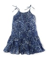 A bohemian-inspired batik print accents the ruffled hem of a pretty sundress for effortless summer style.