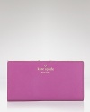 This simple wallet takes kate spade new york's day-right style to sophisticated terrain. Not only does it boast ample pockets, but there's luxe leather for added allure.