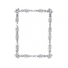 Hand-set Swarovski® crystals add a regal opulence to this brilliant frame.