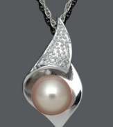 Set sail in this shimmery, summery style. A uniquely-cut pendant resembles a sailboat and shines with the addition of round-cut diamond accents and a pink cultured freshwater pearl center. Set in sterling silver. Approximate length: 18 inches. Approximate drop: 9/10 inch.