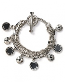 MARC BY MARC JACOBS' silver chain bracelet has designer appeal. Trimmed in the label's charms, this jazzy style has fashion forward written all over it.