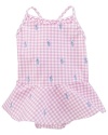 Pretty skirted swimsuit rendered in gingham-printed stretch nylon and finished with allover embroidered ponies for timeless heritage style.