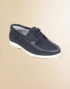 He'll look nautical and nice in classic boat shoes with stitching and lace detail. Lace-up closureLeather upper90% cotton/10% leather liningRubber soleImported