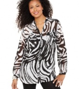 Into the wild! Style&co.'s zebra-print tunic has a graphic look that pairs perfectly with jeans and leggings.