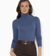 Lush, refined yarns of wool, angora and cashmere lend sleek sophistication to a classic-fitting petite turtleneck sweater.