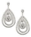 Glitter and glamour! A distinctive orbital design sets apart these stunning drop earrings from Givenchy. Adorned with dazzling glass accents and sparkling crystals, they're set in silver tone mixed metal. Approximate drop: 2-1/4 inches.