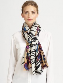 Colorful, contrasting zebra and paisley patterns are double-side printed on buttery soft cashmere with eyelash trim.CashmereAbout 36 X 80Dry cleanImported