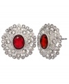 Stunning in scarlet. Featuring crimson-colored resin surrounded by sparkling crystals and glass accents, Monet's button stud earrings make a glamorous impact. Set in silver tone mixed metal. Approximate diameter: 3/4 inch.