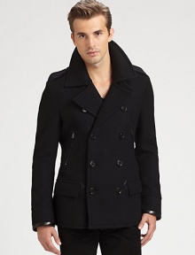 A sleek interpretation of a traditional gentleman's essential, this modern, trim-fitting Italian wool coat features handsome military-inspired epaulets, vertical zip pockets at the front and leather trim at the cuffs.Button-frontShoulder epaulettesZippered chest, waist flap pocketsAbout 27 from shoulder to hemWoolDry cleanMade in Italy