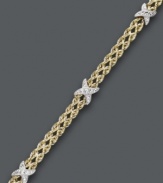 Two tone color for ultimate versatility. Crafted from 14k gold over sterling silver and sterling silver, this double row rope bracelet receives an extra-stylish touch with the addition of X-shaped accents. Approximate length: 7-1/2 inches.