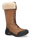 Stomp through snow drifts--stylishly. UGG® Australia's tall leather lace-ups feature a cozy-cool shearling lining.