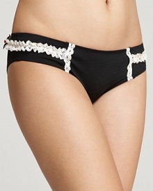 What's more romantic than rosettes and white lace? Betsey Johnson's bikini brings boudoir style to the beach.