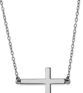 Try on the latest sideways cross trend. Studio Silver's pretty style is crafted in sterling silver with a matching chain. Approximate length: 18 inches. Approximate drop: 1/2 inch.