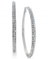 Go big and bold. These hoop earrings from Vince Camuto are crafted from silver tone mixed metal and feature rows of clear glass accents adorning the outside. Approximate drop: 3-1/4 inches.