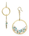 Turquoise stones and striking crystals take these hoop earrings from Chan Luu from simple to stunning. Like her signature wrap bracelets, this pair lends an effortless dose of eclectic beauty.