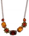 Bold and beautiful. Betsey Johnson's frontal necklace, crafted from brown gold-tone mixed metal, features colorful glass stones and crystal accents for a look that will definitely stand out. Approximate length: 16 inches + 3-inch extender. Approximate drop: 3/4 inch.