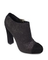 Step into the cap toe-and booties-trends in these stylish Sam Edelman boots. Glitter gives them extra dazzle.