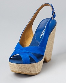 In the season's blue cobalt hue, these Bettye Muller wedges exude vibrant color that adds zest to summer style. Pair them with an equally saturated hue on top for standout style.