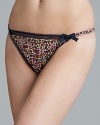 Feel fabulous in this printed, lace-trimmed, crepe thong.