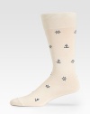 Brightly colored anchor details adorn these lightweight, stretch dress socks.Mid-calf height55% cotton/37% nylon/5% viscose/3% elastaneMachine WashImported