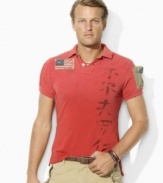 Faded and abraded for a timeworn quality, a trim-fitting cotton mesh polo is accented with an Asian-inspired graphic and a rugged American flag patch for international style.