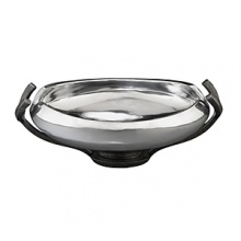 Crafted from stunning metal alloy, this lovely bowl is destined to become a go-to piece. Its pod-shaped vessel artfully frames whatever you put in it with its gently curling lip and a dose of glossy shine, and then tapers to a graceful pedestal base.