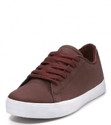 Skater-style from Supra, this soft satin tuf sneaker has a chunky rubber sole and wide footbed.