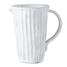 Handmade and inspired by the maestro artisan's family heirloom dinnerware, this stripe pitcher makes a rustically sophisticated dining statement.