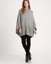 EXCLUSIVELY AT SAKS.COM. Wool-rich cape with intricate open-knit trim is a lesson in casual elegance. Ribbed funnelneckButton frontLong cape sleevesAbout 33 from shoulder to hemWool/viscose/polyesterDry cleanImported of Italian fabricSIZE & FITModel shown is 5'10 (177cm) wearing US size Small.This style runs large. We recommend ordering one size down for a standard fit. 