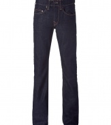 A very special piece: stylish jeans from the California denim specialists True Religion - In dark blue, unwashed cotton - Modern low rise, sits on the hips - Classic 5-pocket cut with back flap pockets and accentuating contrast stitching - Straight cut (straight leg fit) - Zip close - Pair with a cool T-shirt and leather jacket - Also fits with a blazer and cool boots